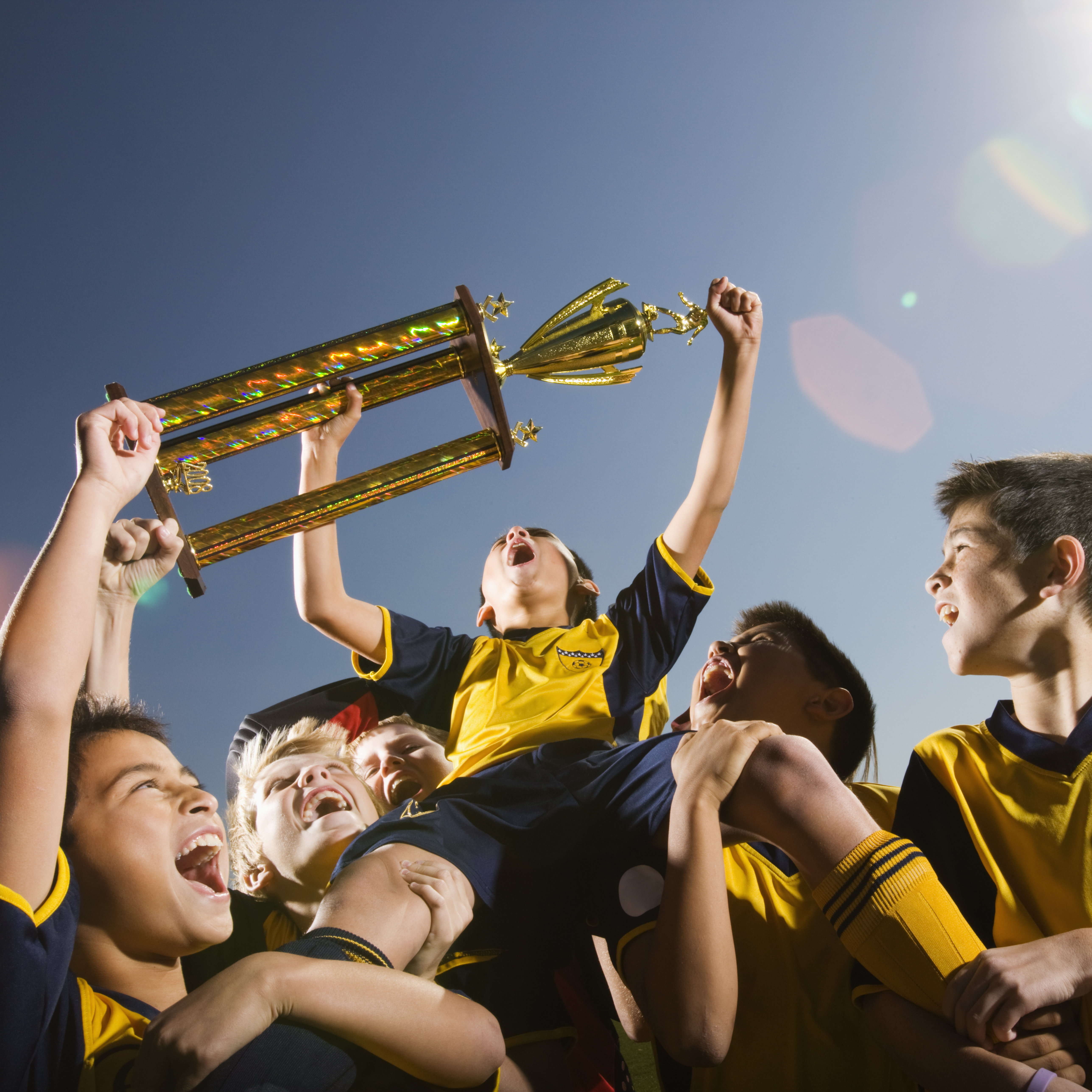Victorious Team Celebrating With Trophy Under Clea 2026 01 09 11 35 49 Utc