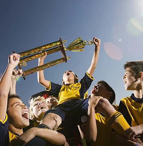 Victorious Team Celebrating With Trophy Under Clea 2026 01 09 11 35 49 Utc